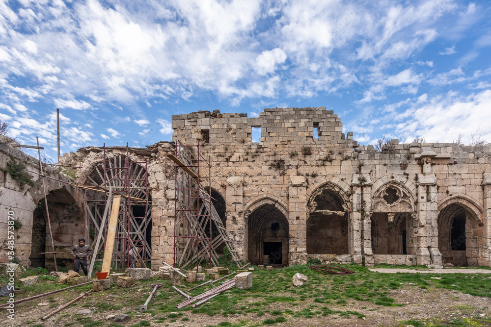 Krak de Chevaliers Crusader Castle damaged during Syria Civil War - obrazy, fototapety, plakaty 