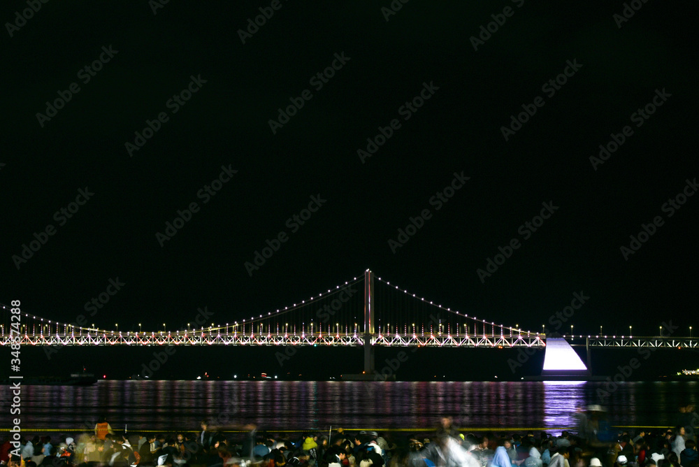 Colorful fireworks and Gwangan Bridge in Busan City , South Korea.