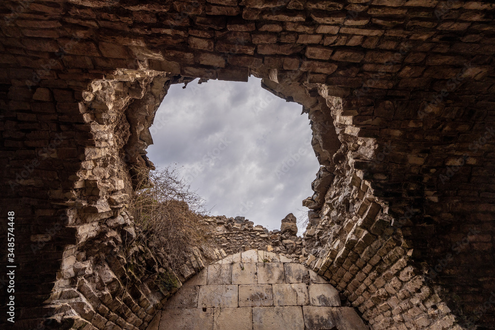 Krak de Chevaliers Crusader Castle damaged during Syria Civil War - obrazy, fototapety, plakaty 