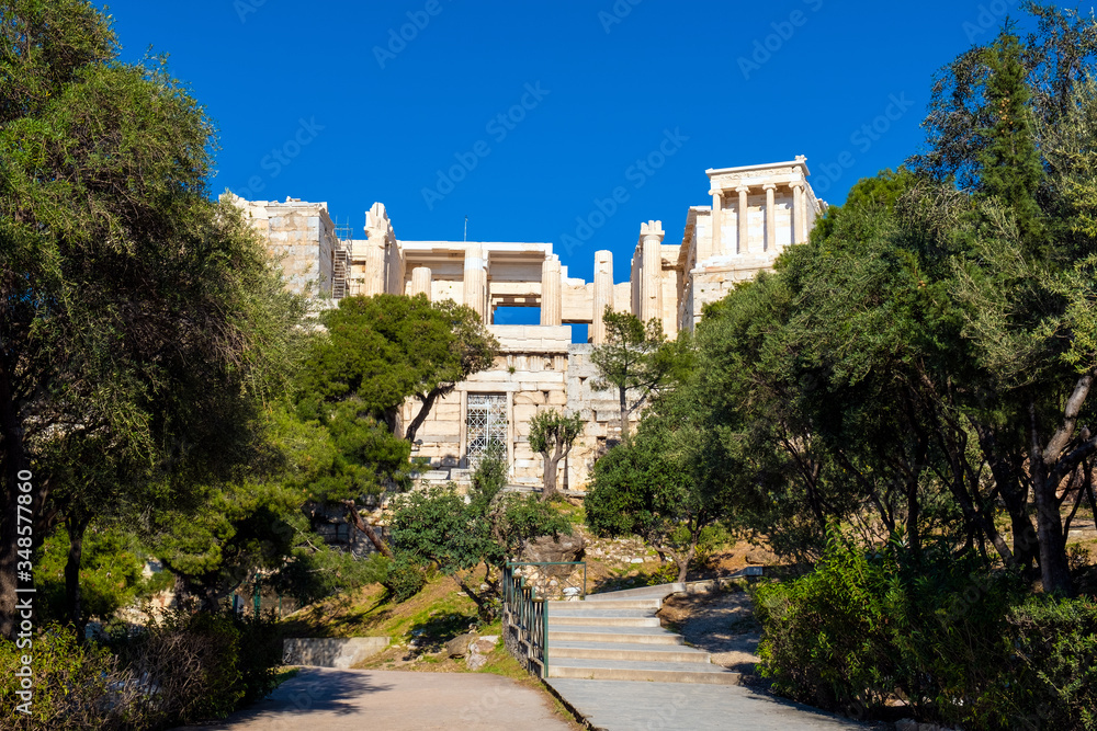Panoramic view of Acropolis of Athens with Propylaea monumental gateway and Nike Athena temple in ancient city center in Athens, Greece