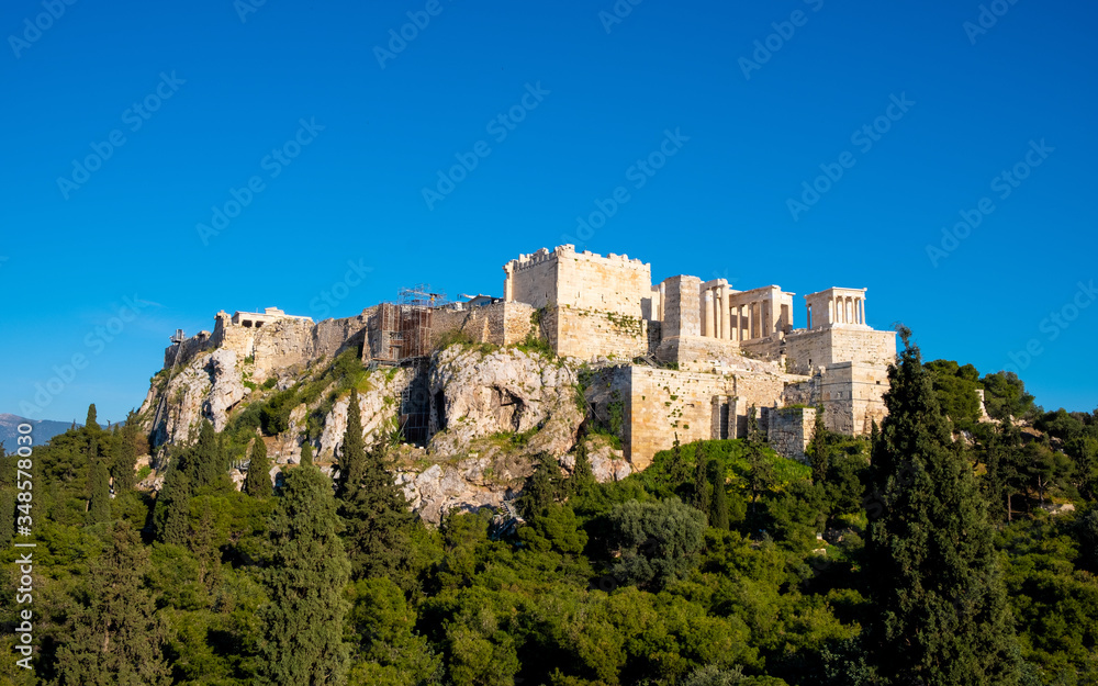 Panoramic view of Acropolis of Athens with Propylaea monumental gateway and Nike Athena temple seen from Aeropagus rock in Athens, Greece