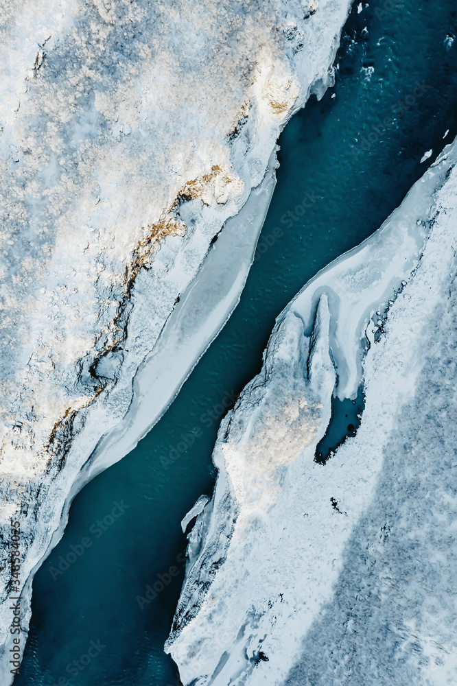 Aerial view of a river in Iceland with turquoise water, Melting Ice, Climate Change and Global Warming Concept 
