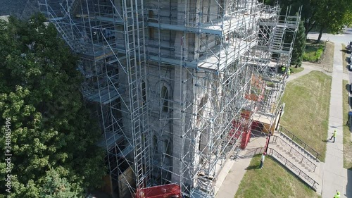 High scaffolding around a tall church steeple, Davenport, Iowa, USA photo
