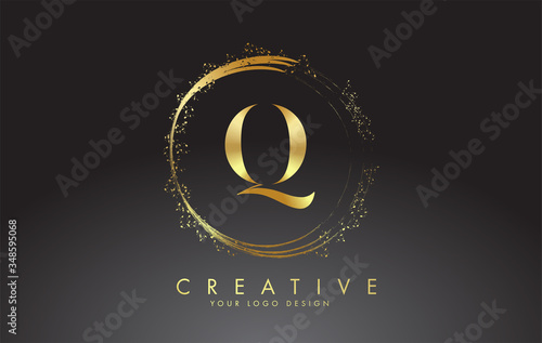 Q golden letter logo with golden sparkling rings and dust glitter on a black background. Luxury decorative shiny vector illustration.