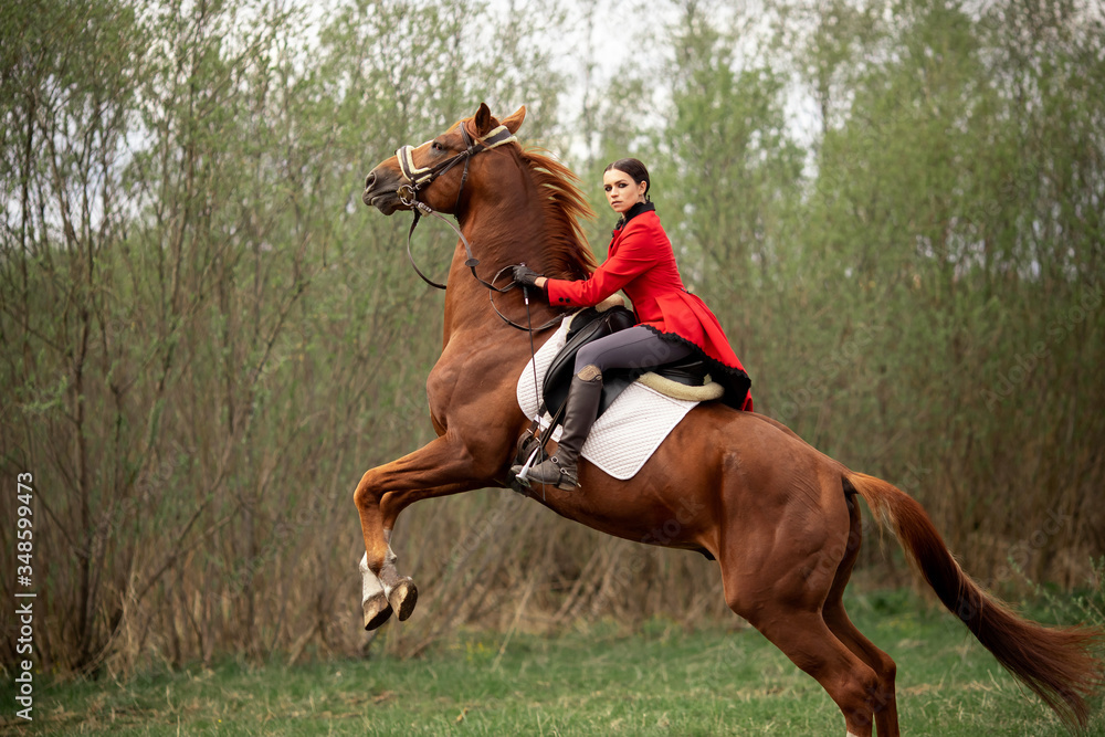 Woman jockey performs candle trick on horse racetrack Woman jockey performs candle trick on horse racetrack