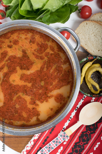 Top view of plate with meatballs soup, traditional plate of the Romanian cuisine,ciorba de perisoare photo