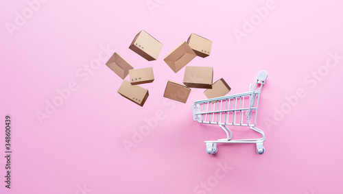 Online shopping concepts with small trolley and product package box.Ecommerce market.Transportation logistic.Business retail