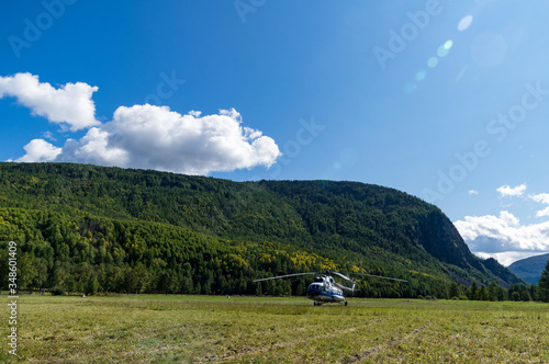 takeoff and landing helicopter in the mountains