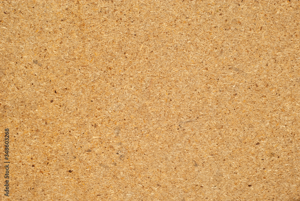 Texture from boards. Surface of wooden table. Tiles from sawdust and woodworking waste. Texture from boards. Surface of wooden table. Tiles from sawdust and woodworking waste.