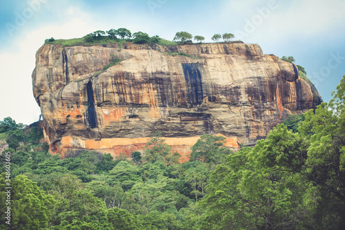 A lonely ancient rock fortress of Sigiriya rock which is prominent for unique historical and archaeological significance.