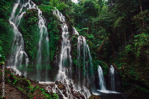 Fototapeta Naklejka Na Ścianę i Meble -  Cascade waterfalls in tropical rain forest at Bali
