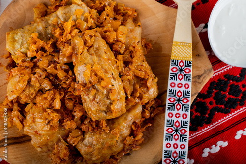 Sarma is a dish of vine, cabbage rolls stuffed with minced meat. Traditional romanian, greek photo