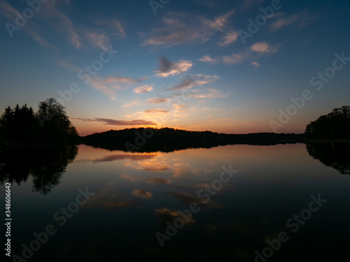 Amazing sunset, with beautiful sky reflections in the water of Hancza lake. Suwalski landscape park, Podlaskie, Poland