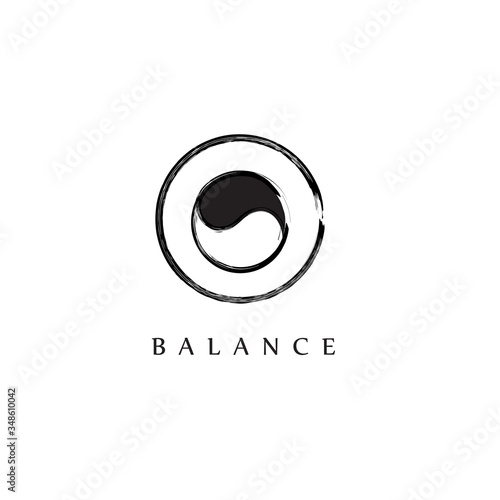 simple abstract logo design of yin yang symbol with circular brush stroke