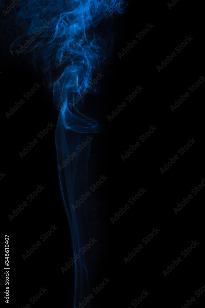 The movement of the smoke on a black background . The movement of the smoke on a black background .