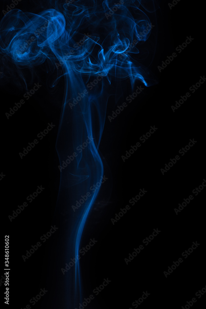 The movement of the smoke on a black background . The movement of the smoke on a black background .
