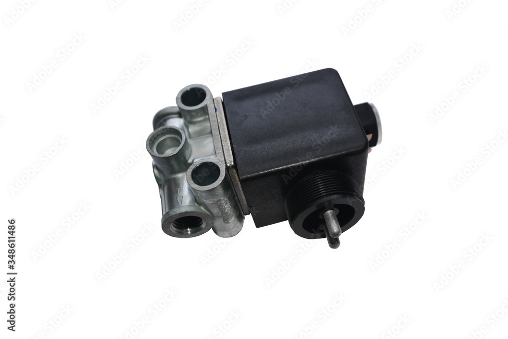 Electromagnetic valve of blocking of wheels of the car on an isolated white background. Spare parts. Electromagnetic valve of blocking of wheels of the car on an isolated white background. Spare parts.