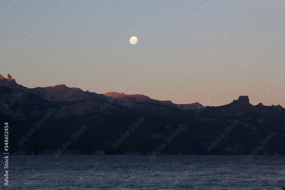 moon over the lake and mountains