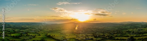 Sunset over the fields, landscape panorama, Hills on Church Stretton, Carding Mill Valley, England, Europe
