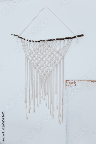 thread macrame on a white background