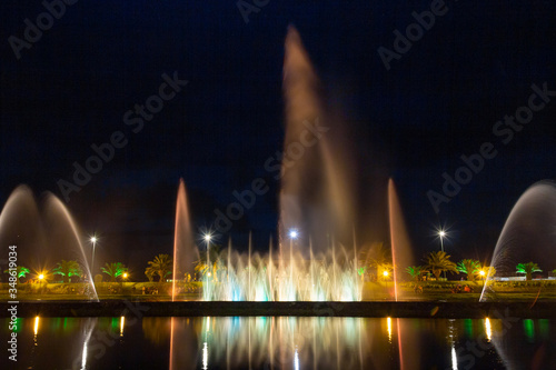 Bright high jets of singing and dancing fountains in the night sky on the embankment of the city of Batumi. Considered a number one attraction. Adjara Autonomous Republic, Georgia, Eurasia.