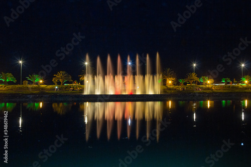 A famous attraction in Batumi is the bright singing and dancing fountains on the promenade. Night photo, selective focus. Adjara Autonomous Republic, Georgia, Eurasia. Festive mood.