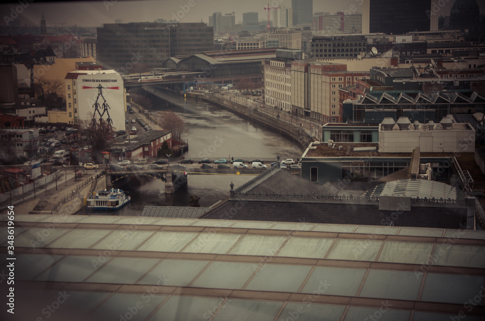 View of the city of Berlin from a window in the daytime, in winter View of the city of Berlin from a window in the daytime, in winter