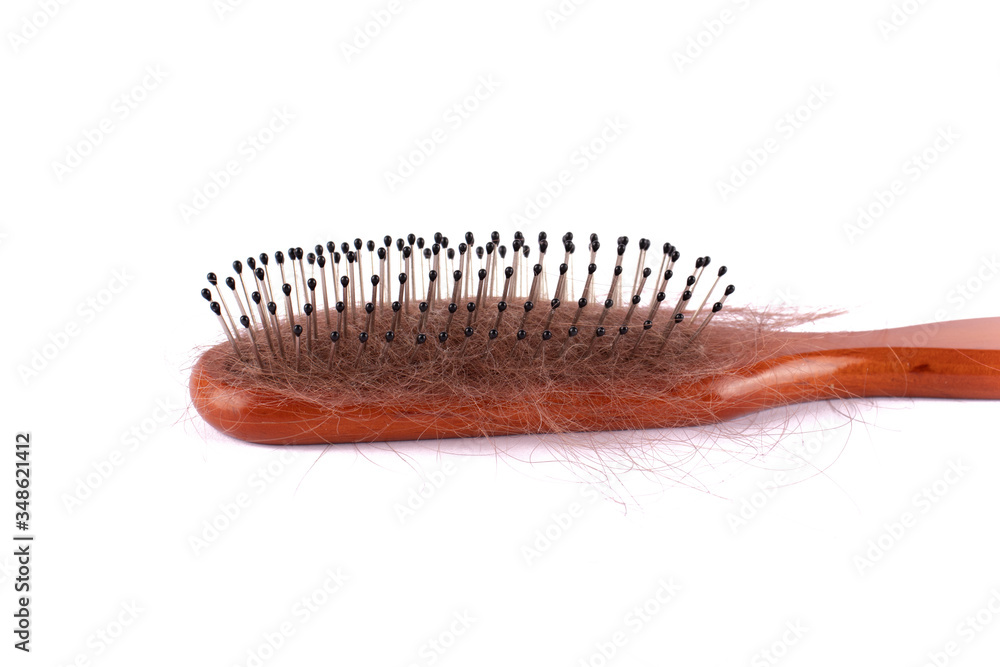 Hair brush. The problem of hair loss. Health concept.