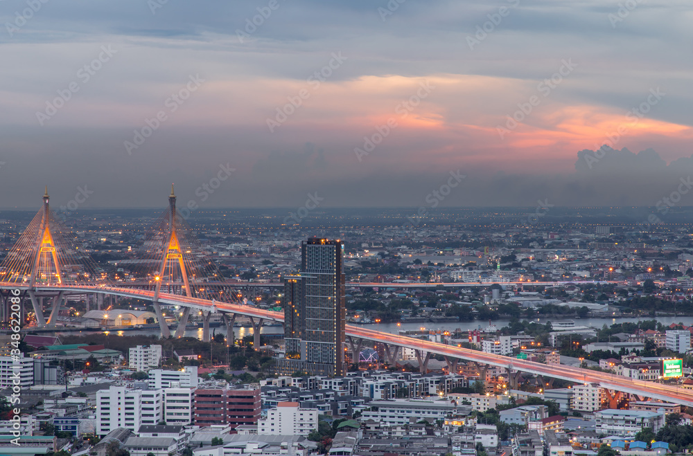 Beautiful view of Bangkok city, Beauty skyscrapers along Chaopraya river in the evening, making the city modern style.