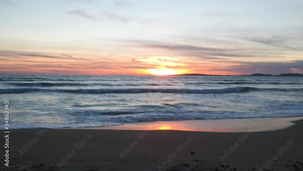 Sunset front with the sea on the horizon . Sunset front with the sea on the horizon .
