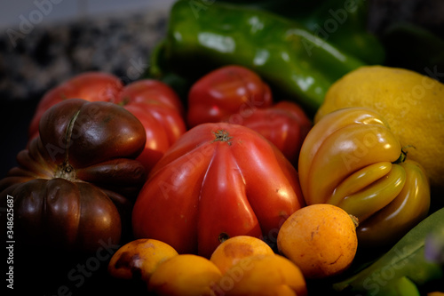 Fruit presentation with various colorful fresh fruits and vegetables