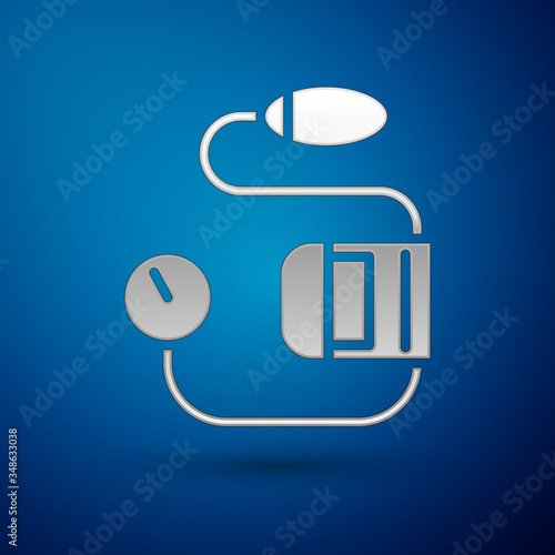 Silver Blood pressure icon isolated on blue background. Vector