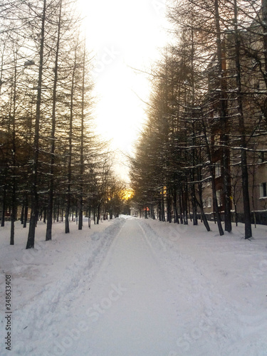 A deserted city alley on a frosty winter morning in northern Russia.