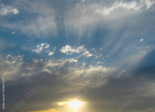 sun rays and clouds