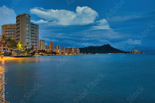 Night photo of Waikiki featuring Diamond Head on Oahu. © manuel