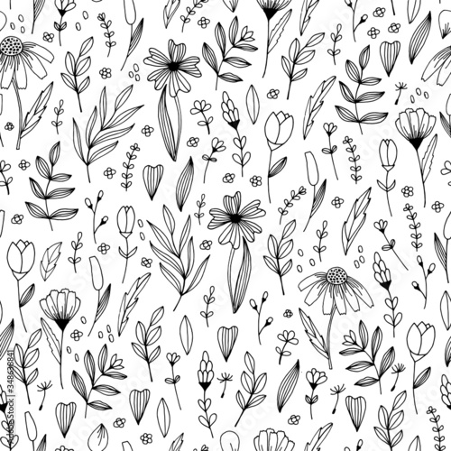 Handdrawn doodle flowers and leaves vector seamless pattern. Spring summer print for fabric and paper. Stem petals branches herb in sketchy style.
