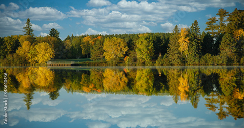 autumn landscape with lake and trees. Reflection in Minnesota Lake.  Outdoor Landscape fall day. 