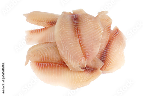 fresh raw tilapia fish fillet isolated on white background