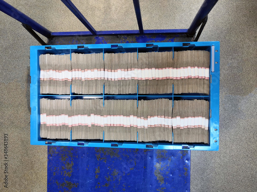 a full cash cassette located on a moving cart