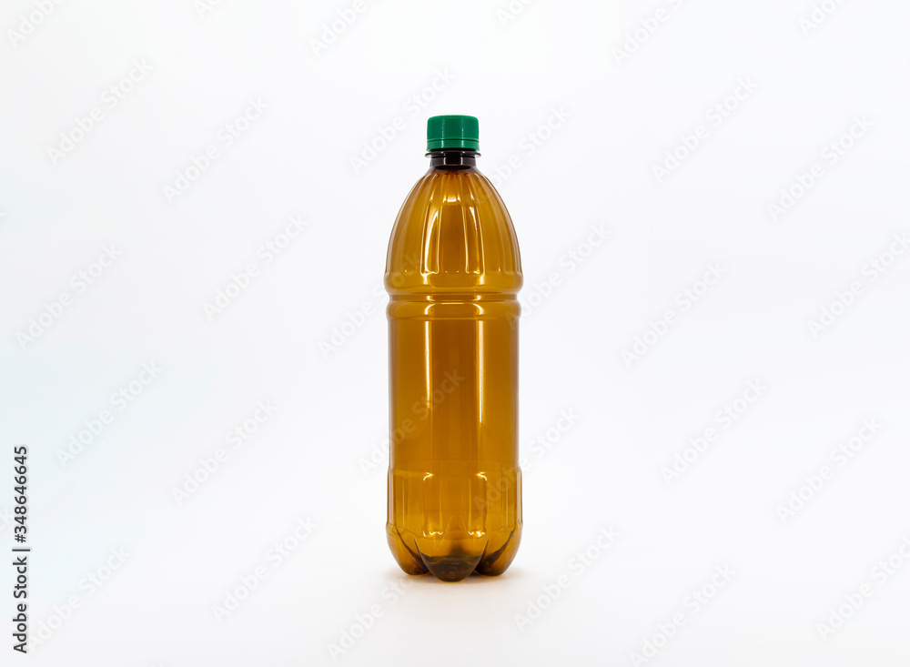 Brown empty plastic bottle on isolated white background.Can be use for your design.High resolution photo.