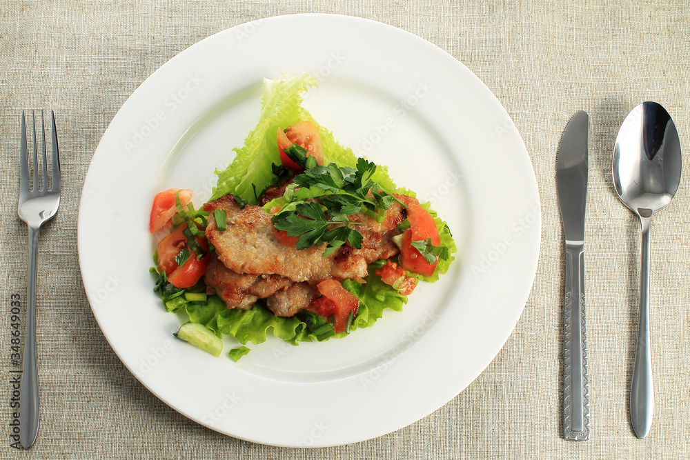 close up of potato with chicken with vegetables and salad on plate close up of potato with chicken with vegetables and salad on plate