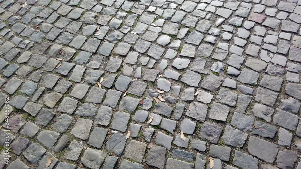 walking on cobblestone pavement retro style 4k POV video footage walking on cobblestone pavement retro style 4k POV video footage