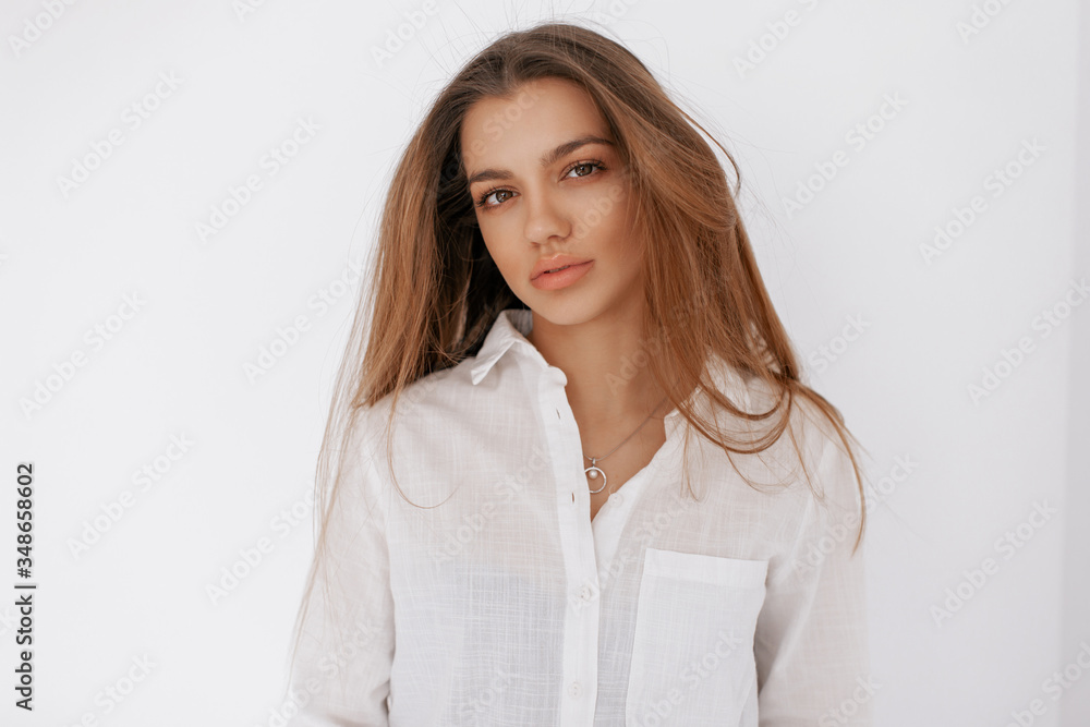 Portrait of beautiful teen girl with flying hair. Beauty and hait concept. Portrait of beautiful teen girl with flying hair. Beauty and hait concept.