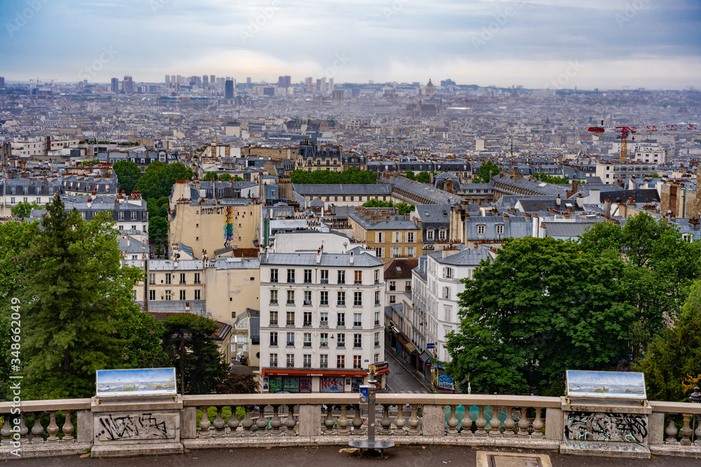 Paris, France - 05 09 2020: Montmartre district. View of Paris from sacred heart place, during confinement against coronavirus