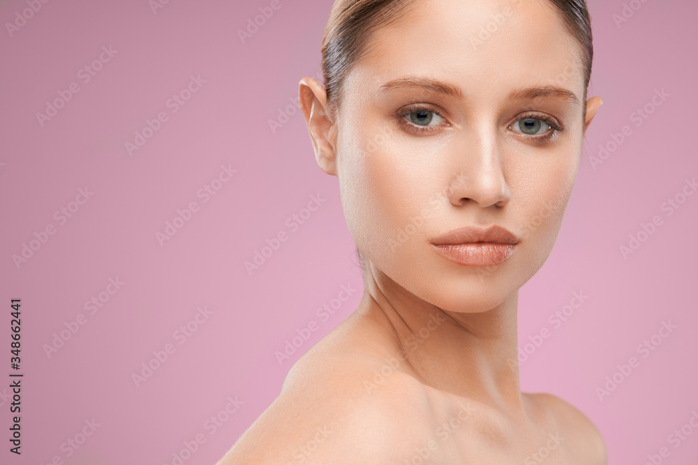 Fototapeta premium Young attractive blonde woman posing in studio.