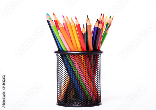 colored pencils in a glass