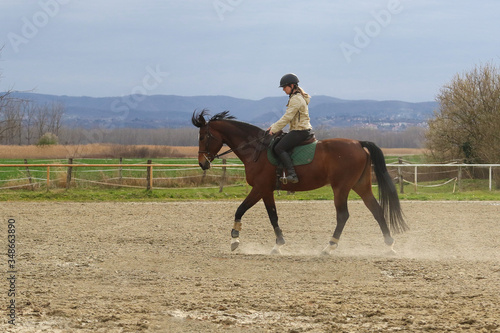 Recreation, girl riding mare