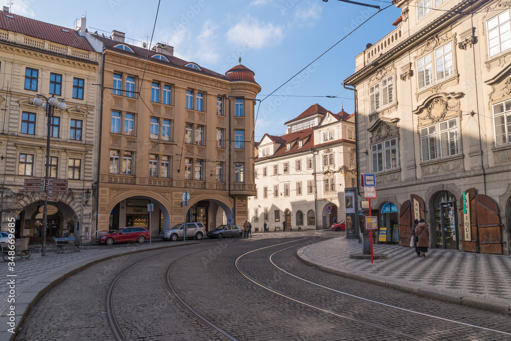 Streets in downtown Prague tramline and historical buildings