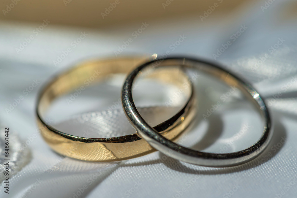 two wedding rings on romantic background two wedding rings on romantic background