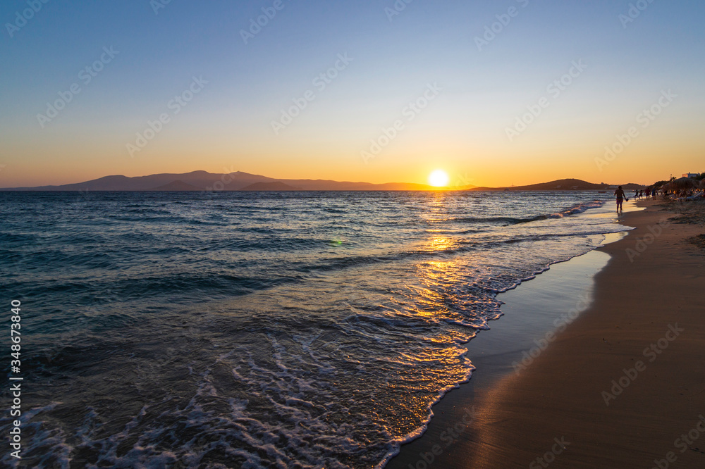 Sunset on the beaches of Naxos in the Cyclades Archipelago, Greece